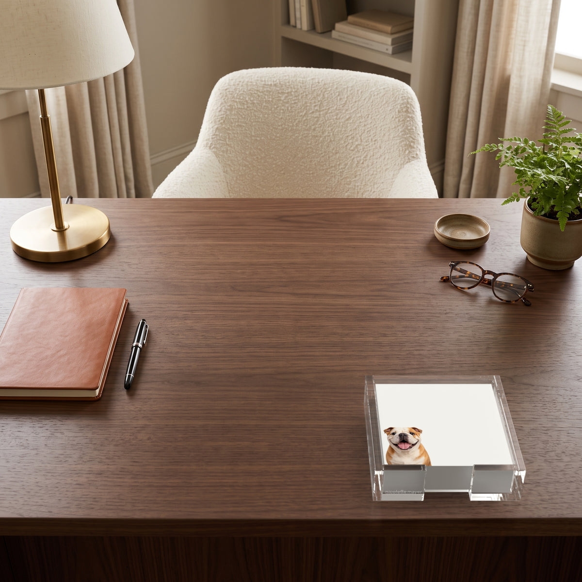 Bulldog note cards in a clear acrylic holder on a walnut desk, by Nicolette Mayer