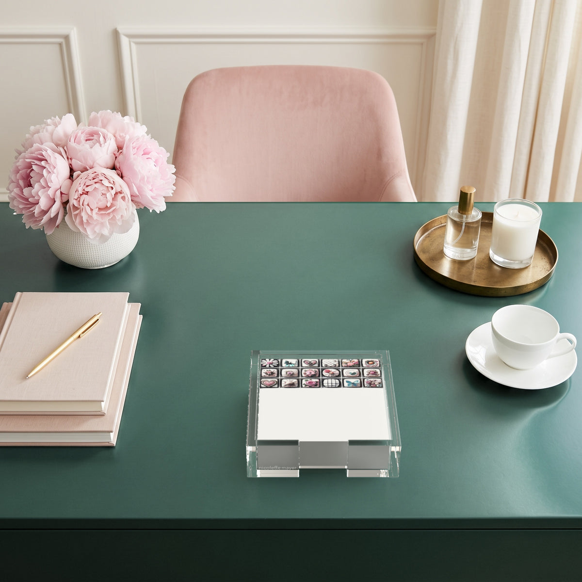 Petite Fours note cards in a clear acrylic holder on a green desk by Nicolette Mayer