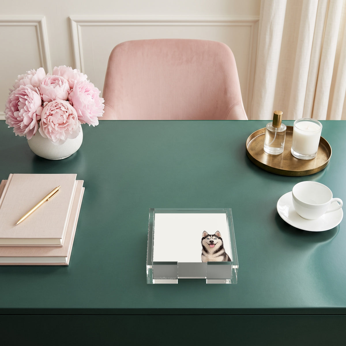 Husky dog note cards in a clear acrylic holder on a green desk, by Nicolette Mayer