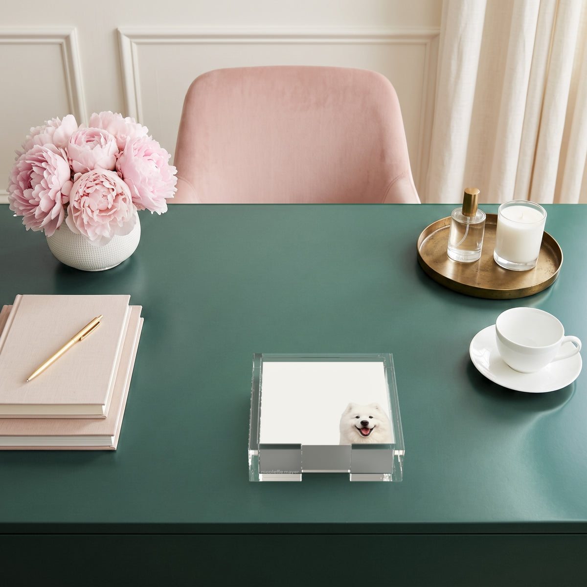 Samoyed dog note cards in a clear acrylic holder on a green desk, by Nicolette Mayer